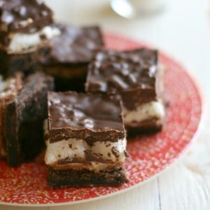 Peanut Butter Crispy Marshmallow Brownies from JensFavoriteCookies.com - fudgy brownies with gooey marshmallows and a crispy chocolate peanut butter topping!