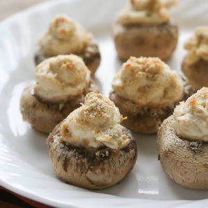 Artichoke Stuffed Mushrooms from JensFavoriteCookies.com - a great meat-free appetizer!